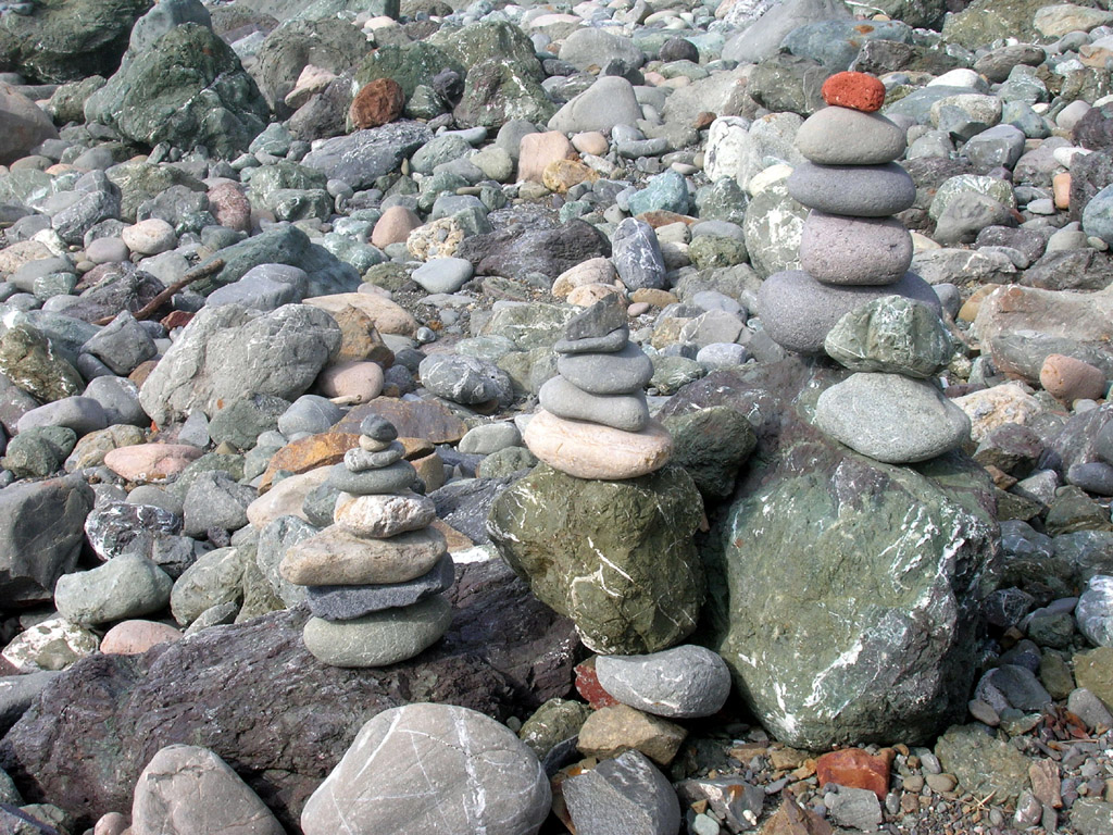 stone piles on Mile Rock beach