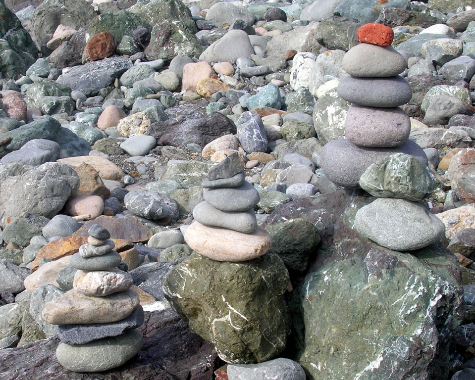 stone piles on Mile Rock beach