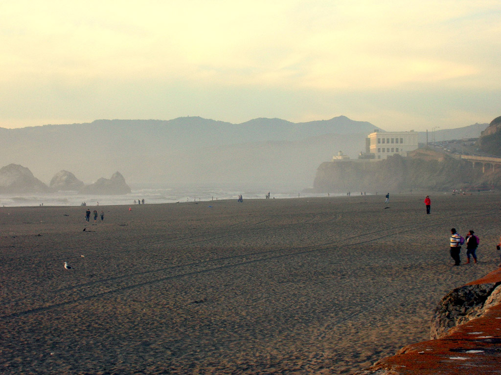 view of the Cliff House from the Ocean Beach esplanade