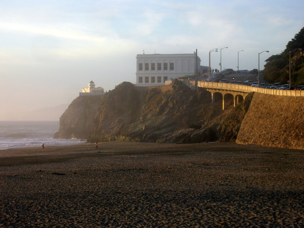 view of the Cliff House from the Ocean Beach esplanade