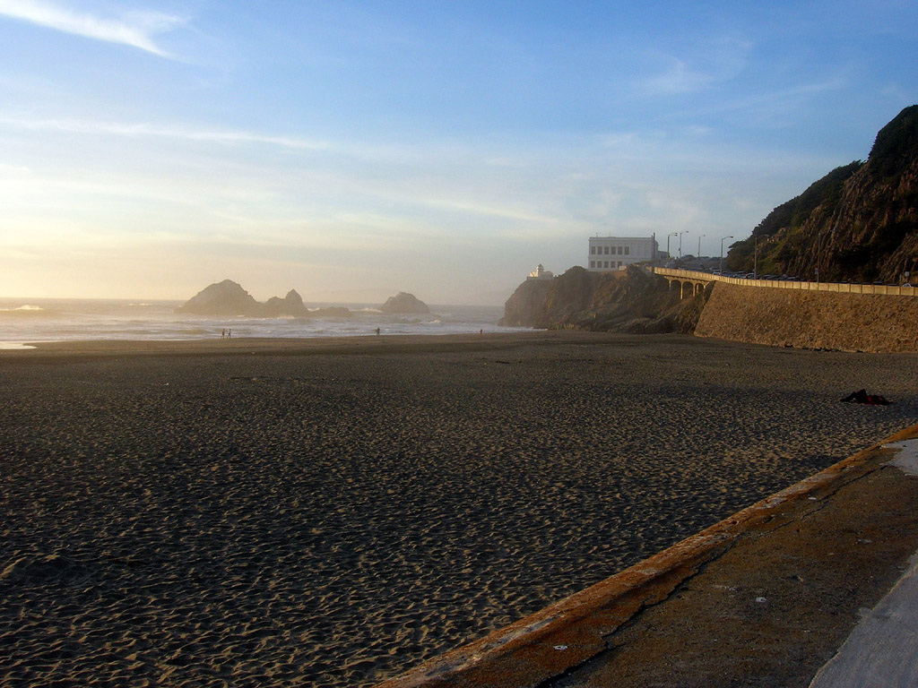 view of the Cliff House from the Ocean Beach esplanade