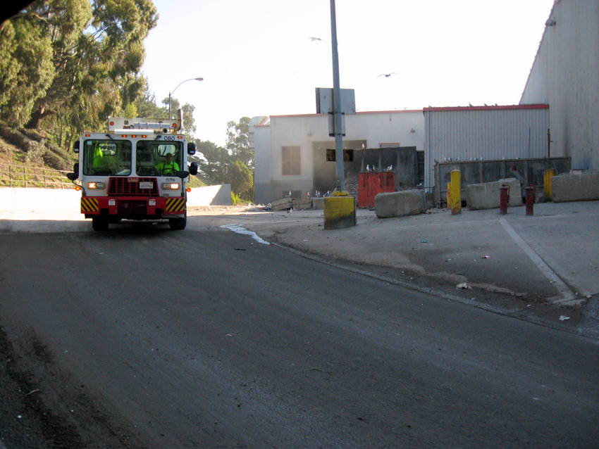 truck emerges from garbage dropoff